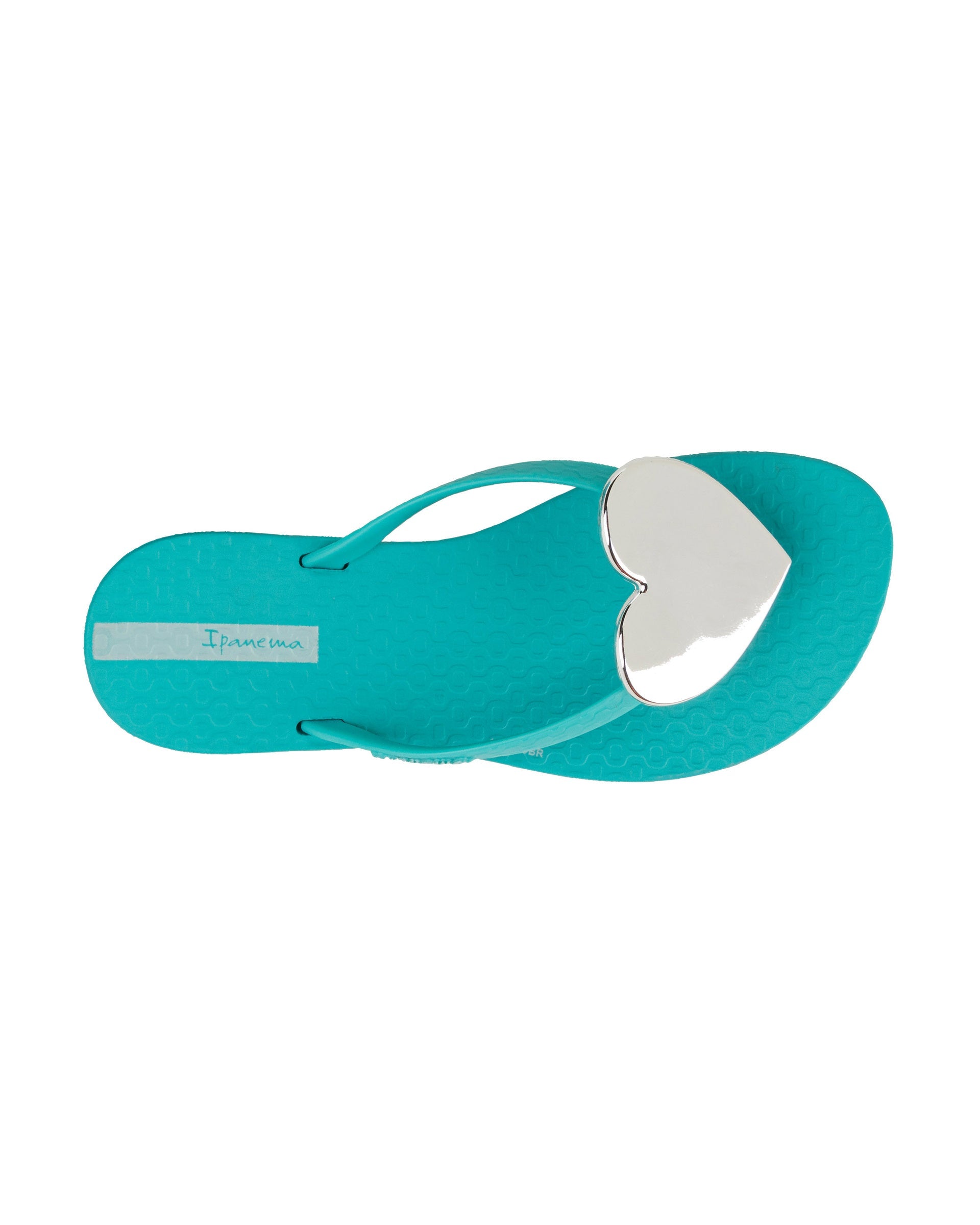 Top view of a blue Ipanema Wave Heart kids flip flop with silver decorative heart on the upper.