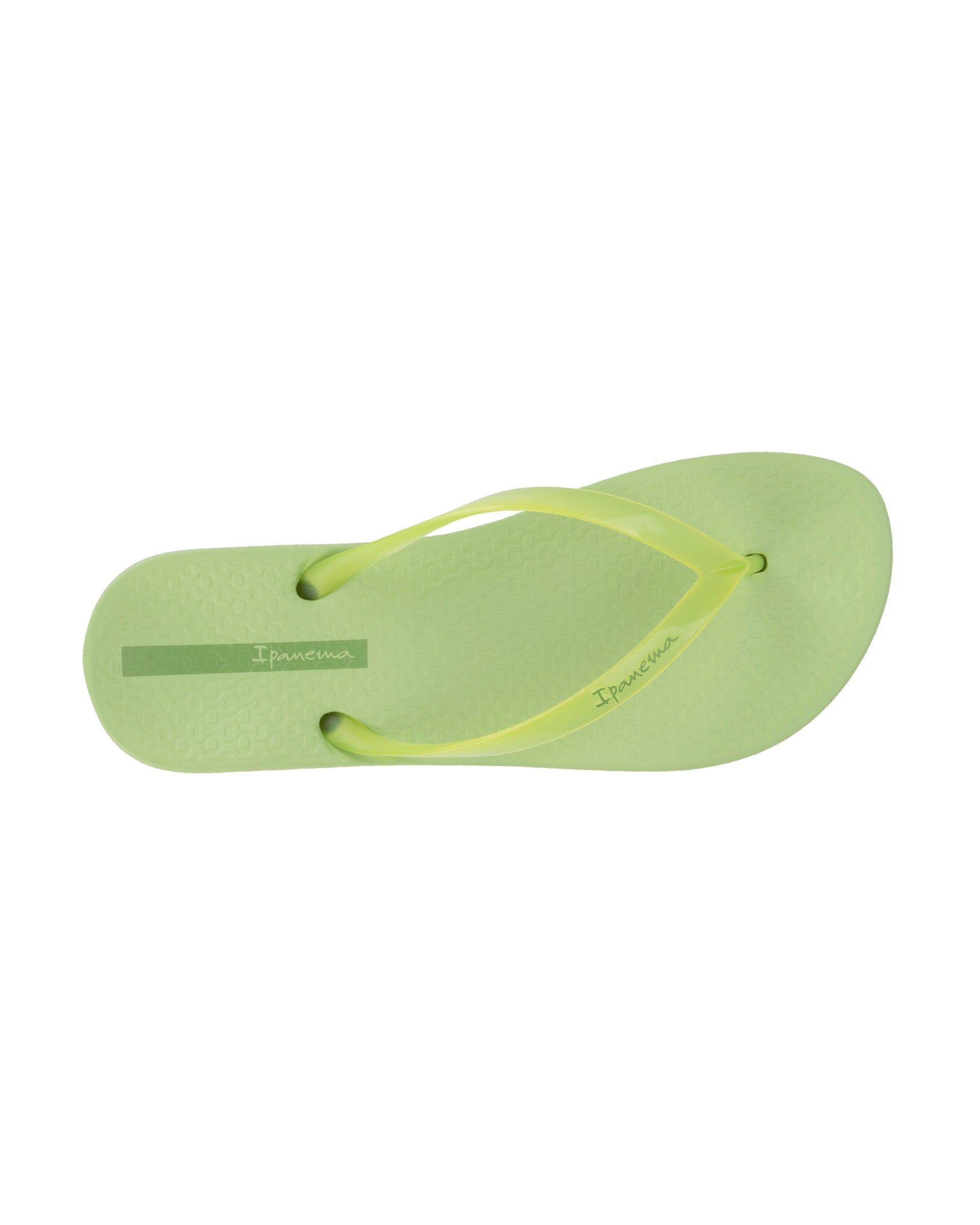 Top view of a green Ipanema Ana Connect women's flip flop with a clear green strap.